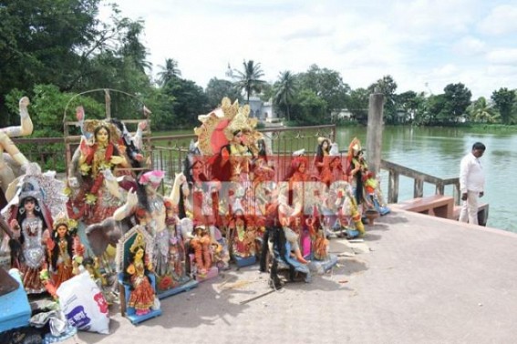 AMC's negligence left Hindu Gods / Goddesses idols on Laxmi Narayan Bari Lake : Dogs peeing over them !